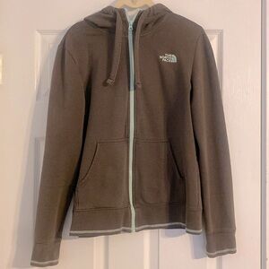 The North Face zip up jacket with hood. Ladies/Womens gray with aqua detail